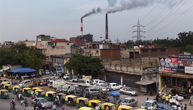 Smoke billows from the coal-based Badarpur Thermal Station in New Delhi