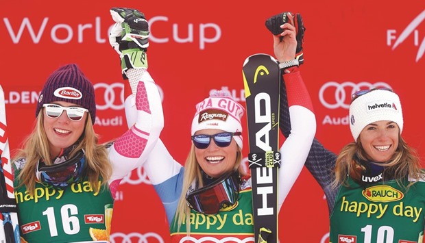 First placed Lara Gut (C) of Switzerland poses with second placed Mikaela Shiffrin (L) of the US and third placed Marta Bassino of Italy in FIS Alpine Skiing World Cup Giant Slalom in Soelden yesterday. (Reuters)
