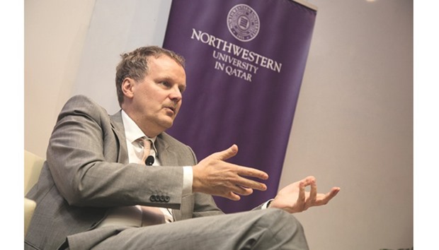 Andrei Richter speaking at Northwestern University in Qatar.