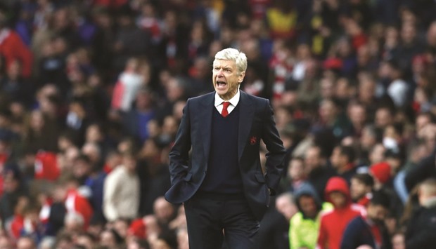Arsenalu2019s French manager Arsene Wenger gestures on the touchline during the EPL match against Middlesbrough.