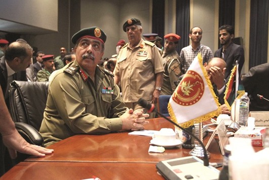 Libyan Chief of General Staff, Major General Abdel Razek Nazawra (left) takes part in a conference titled u201cDocumenting war crimesu201d yesterday in Libyau2019s second city Benghazi.
