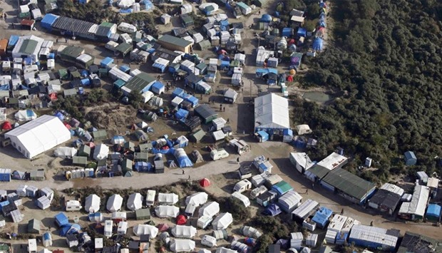 An aerial view shows tents and makeshift shelters in Calais