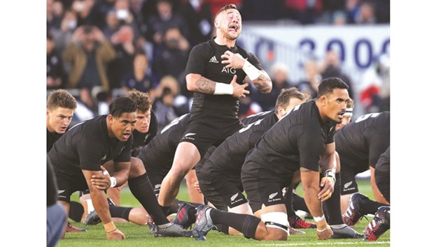 New Zealandu2019s TJ Perenara (centre) performs the haka during the rugby Test against Australia at Eden Park in Auckland on Saturday. (AFP)