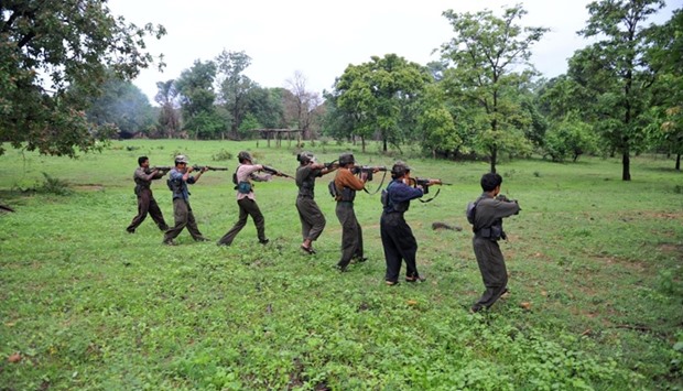 Indian Maoists readying their weapons as they take part in a training camp in a forested area of Bijapur District in the central Indian state of Chhattisgarh. July 8, 2012 file photo.