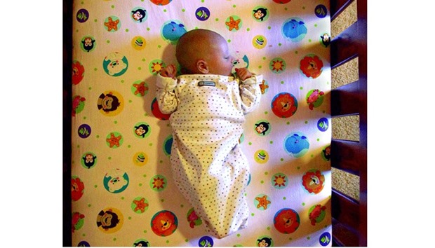 The new policy statement by the American Academy of Paediatrics says babies should sleep on their backs, on a clean surface free of toys and blankets.