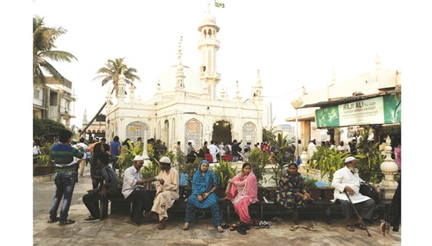 People are seen at the Haji Ali Dargah in Mumbai.
