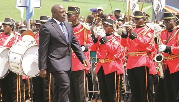 File photo of Democratic Republic of the Congo President Joseph Kabila inspecting a guard of honour during the anniversary celebrations of Congou2019s independence from Belgium in Kindu, the capital of Maniema province on June 30, 2016