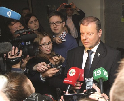 Skvernelis speaks to the media after his party won the Lithuanian parliament election.