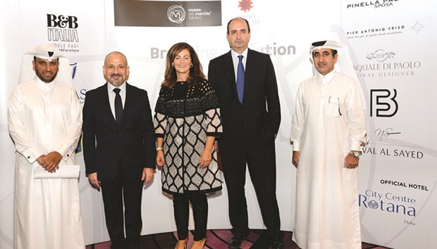 Italian ambassador Guido De Sanctis (second right) joins Rosso Italiano officials yesterday to announce the launch of u2018Branding Evolutionu2019 exhibition in Doha. PICTURE: Thajudeen