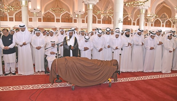 HH the Emir Sheikh Tamim bin Hamad al-Thani and HH the Father Emir Sheikh Hamad bin Khalifa al-Thani performing the funeral prayers for HH Sheikh Khalifa bin Hamad al-Thani at Imam Mohamed bin Abdulwahab Mosque in Doha.
