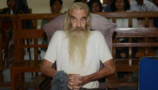 Robert Andrew Fiddes Ellis of Australia attens his trial inside a court room in Denpasar on Bali island.
