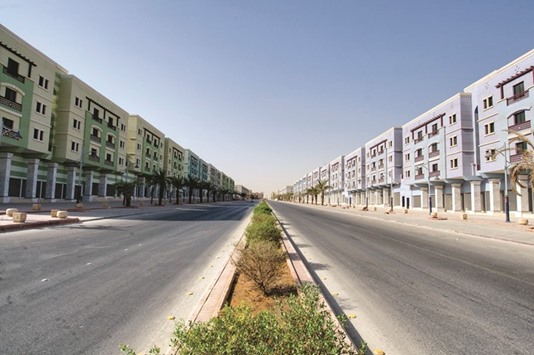 A residential development project is seen in Riyadh. Saudi Arabiau2019s austerity drive will pressure peopleu2019s ability to buy their own homes and could push housing prices in some segments down by nearly a third, the local director of real estate services firm JLL said yesterday.