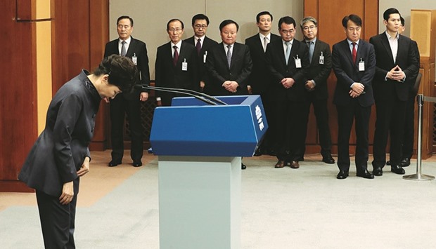 President Park bows after releasing the statement of apology to the public during a news conference at the Presidential Blue House in Seoul.