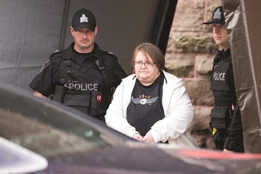 Elizabeth Tracey Mae Wettlaufer leaves the courthouse in Woodstock, Ontario.