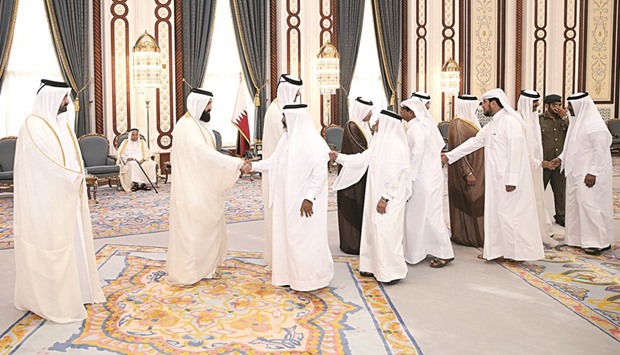 HH the Emir Sheikh Tamim bin Hamad al-Thani and HH the Father Emir Sheikh Hamad bin Khalifa al-Thani receiving mourners on the death of the late HH the Grandfather Emir Sheikh Khalifa bin Hamad al-Thani, at Al Wajba Palace yesterday.