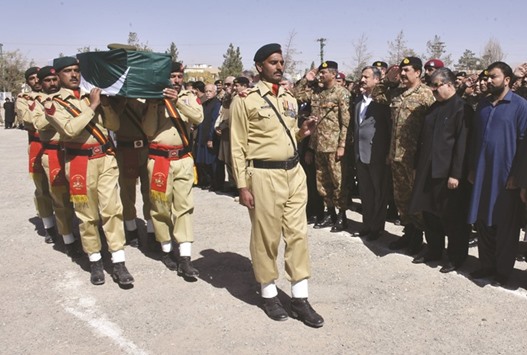 Balochistan province Chief Minister Nawab Sanaullah Zehri (second right), Pakistan Army Chief General Raheel Sharif (third right) and Directorate General for Inter-Services Intelligence (ISI) Lieutenant-General Rizwan Akhtar (fourth right) attend the funeral ceremony of army Captain Roohullah who was killed in an attack on the Police Training College Balochistan in Quetta.