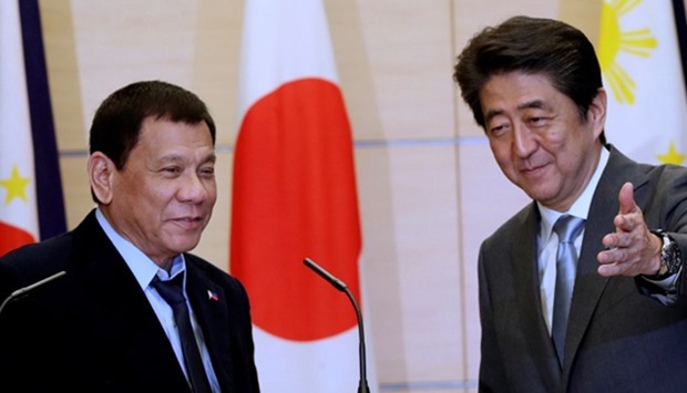 Philippine President Rodrigo Duterte with Japan's Prime Minister Shinzo Abe