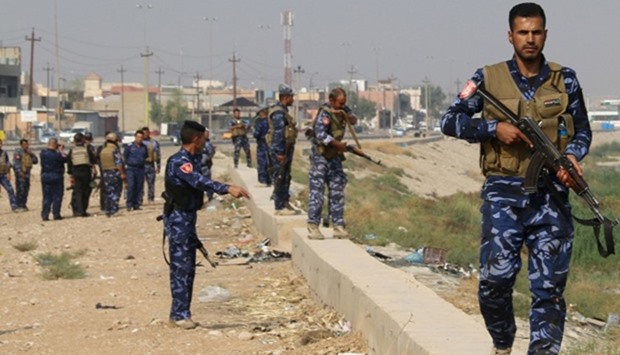 Iraqi government forces patrol the area of Kirkuk for members of the Islamic State