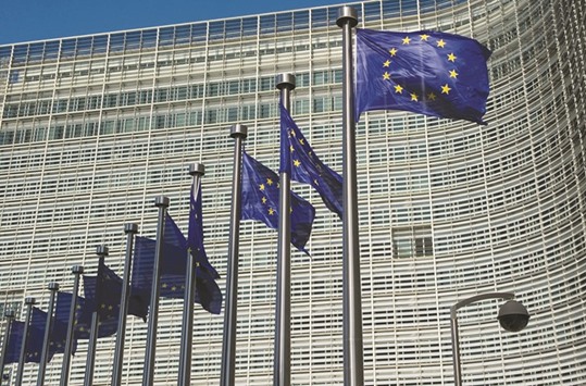 EU flags fly outside the European Commission headquarters building in Brussels. In legislation to be released as early as next month, the European Commission plans to include a measure that will cut the capital banks need when they receive collateral from clients for trades settled at clearinghouses, according to a commission document summarising the proposal seen by Bloomberg.