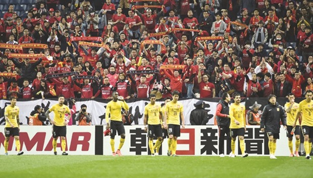 Chinau2019s Guangzhou Evergrande have drawn comparisons with Real Madrid and Manchester United and are eyeing global recognition. (AFP)