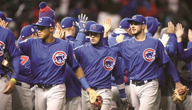 Chicago Cubs players celebrate after defeating the Cleveland Indians in game two of the 2016 World Series at Progressive Field. PICTURE: USA TODAY Sports