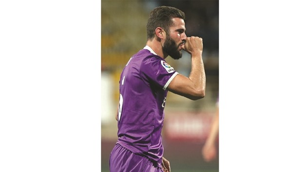Real Madridu2019s defender Nacho Fernandez celebrates after scoring a goal. (AFP)