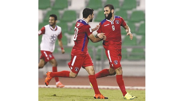 Al Shahaniau2019s Mohamed Tiaiba (right) celebrates with a teammate after scoring a goal against Al Sailiya during a Qatar Stars League match at the Al Ahli stadium last night. PICTURES: Anas Khalid / Noushad Thekkayil