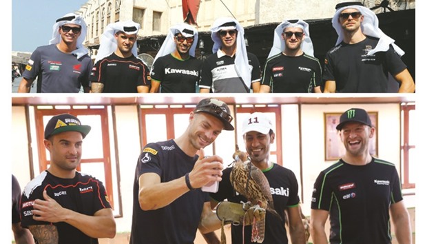 Pedercini Racingu2019s Qatari rider Saeed al-Sulaiti guided his racing counterparts Tom Sykes (Kawasaki Racing Team), Jordi Torres (Althea BMW Racing Team), Xavi Fores (Barni Racing Team), Leon Camier (MV Agusta Reparto Corse) and Michael van der Mark (Honda World Superbike Team) through the incredible Souq Waqif in Doha yesterday. (Right) Camier clicks a picture with a falcon while the rest of the riders look on at the Falcon Centre. The riders enjoyed Arabic coffee with dried dates, before wearing the traditional Gahfia and Ghitras. (WSBK)