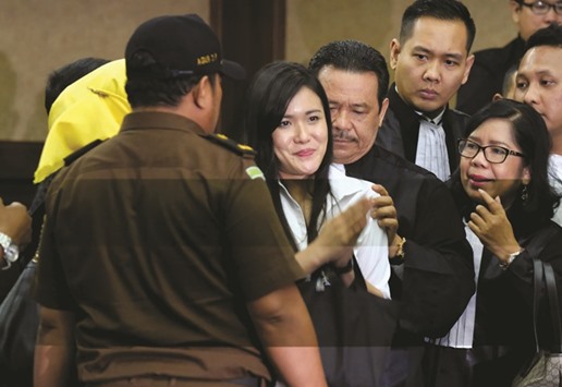 Jessica Kumala Wongso gestures after her trial at the Central Jakarta Court.