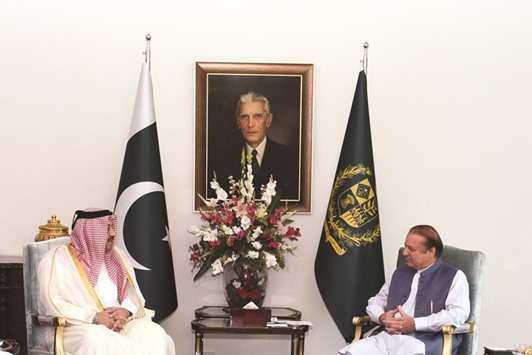 HE the Minister of State for Defence Affairs Dr Khalid bin Mohamed al-Attiyah with Pakistanu2019s Prime Minister, Nawaz Sharif, in Islamabad yesterday.