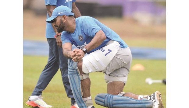 India captain Mahendra Singh Dhoni shadow practices during a training session in Visakhapatnam yesterday. (AFP)