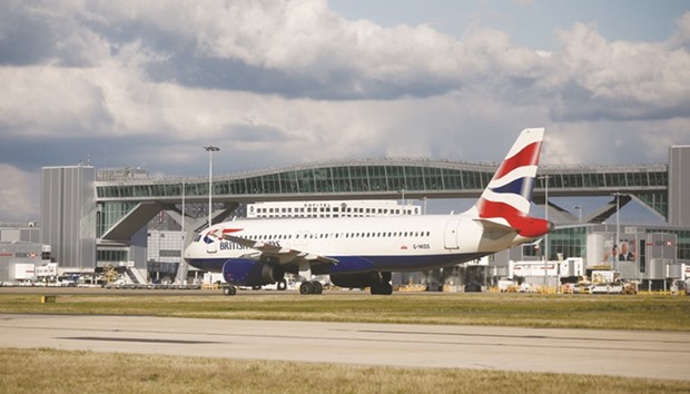 An Airbus SAS passenger aircraft operated by British Airways, a unit of International Consolidated Airlines Group (IAG), taxis on the tarmac at London Gatwick airport. IAG was the top gainer yesterday, adding 5% after third-quarter operating profit beat expectations.