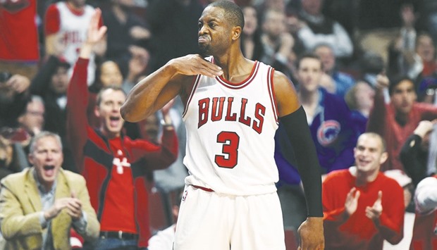 Dwyane Wade of the Chicago Bulls reacts to a three-point shot the Boston Celtics. (AFP)