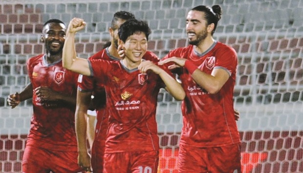 Lekhwiyau2019s Nam Tae Hee is congratulated by teammates after he scored against Al Arabi. PICTURE: Shemeer Rashid