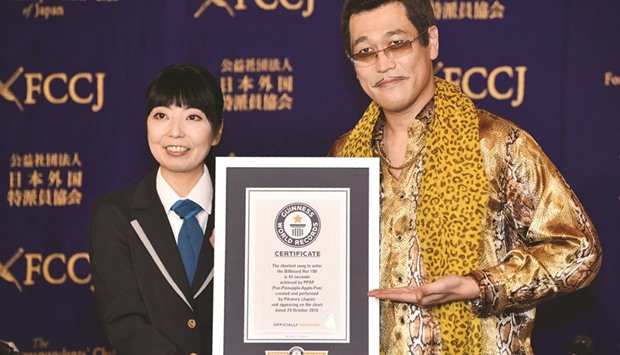 Pikotaro shows his Guinness World Records certificate during a press conference at the Foreign Correspondentsu2019 Club of Japan in Tokyo.