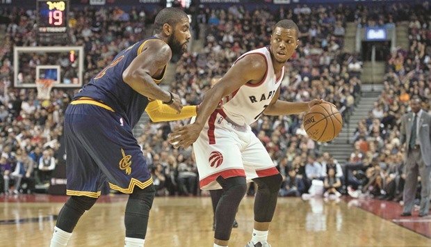 Toronto Raptors guard Kyle Lowry (Right) dribbles the ball as Cleveland Cavaliers guard Kyrie Irving defends during the third quarter at Air Canada Centre. The Cavaliers won 94-91. PICTURE: USA TODAY Sports