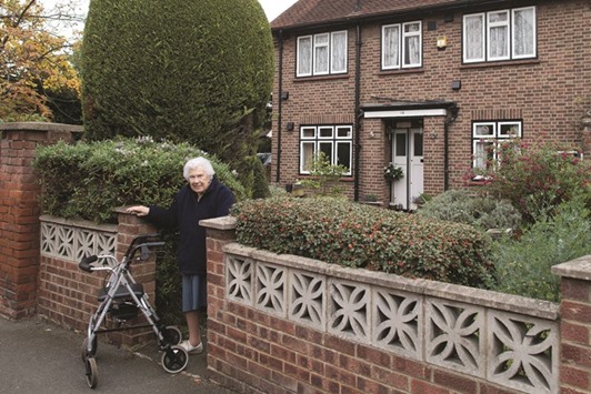 Ruth Bacon, 88, who has lived in her home for 67 years and is believed to be the villageu2019s longest living resident, poses for a portrait in Harmondsworth Village, west London. Much of the historic village will be razed and concreted over under plans to enlarge Europeu2019s busiest airport.
