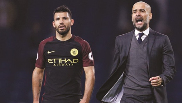 Manchester City manager Pep Guardiola with Sergio Aguero after the match. (Reuters)