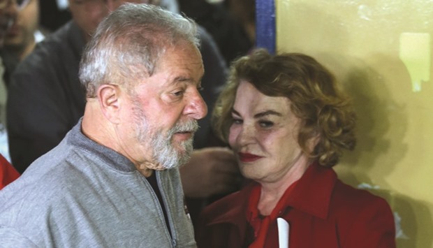 Brazilu2019s former President Luiz Inacio Lula da Silva and his wife Marisa arrive to vote during municipal elections in Sao Bernardo do Campo, Brazil, October 2, 2016.