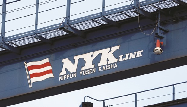 The logo of Japanese shipping company Nippon Yusen (NYK Line) is seen on a container straddle carrier at a dock in Tokyo. Nippon Yusen, Mitsui OSK Lines and Kawasaki Kisen Kaisha said they would form a joint venture that will have u00a52tn ($19.1bn) in combined revenue and control 7% of global container shipping capacity.