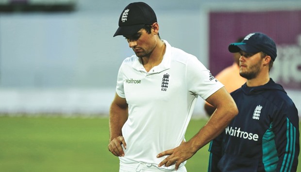 Englandu2019s captain Alastair Cook reacts during the presentation ceremony after they lost the match against Bangladesh.