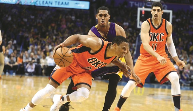 Oklahoma City Thunder guard Russell Westbrook drives to the basket in front of Los Angeles Lakers guard Jordan Clarkson during the third quarter at Chesapeake Energy Arena. PICTURE: USA TODAY Sports