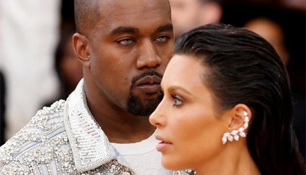 Musician Kanye West and his wife Kim Kardashian are pictured earlier this year.