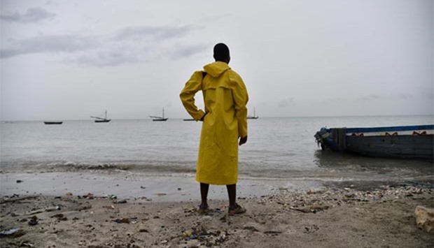 A fisherman looks at the sea in Caira beach, southwest of Port-au-Prince, Haiti on Monday.