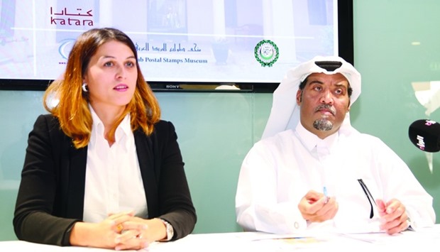 Khalid J al-Emadi (right) speaks at the launch of the Q-Post Arabic e-commerce portal as Maud Daniel looks on. PICTURE: Jayan Orma