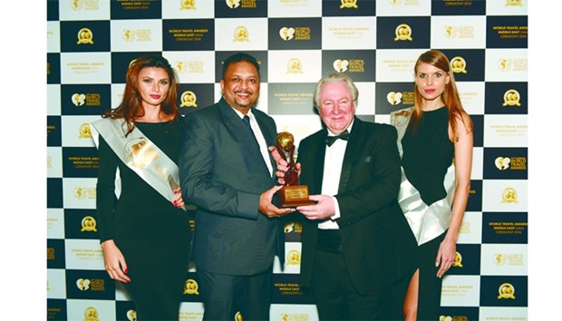 Kallai Aboosabil receiving the award for u2018Qataru2019s Leading Car Rental Companyu2019 on behalf of Regency Fleets, part of Regency Group Holding, during this yearu2019s World Travel Awards ceremony in Dubai.