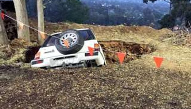   The car that fell into a sinkhole in the Adelaide Hills. 
