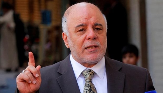 Iraqi Prime Minister Haider al-Abadi speaks to reporters in Najaf on Tuesday.