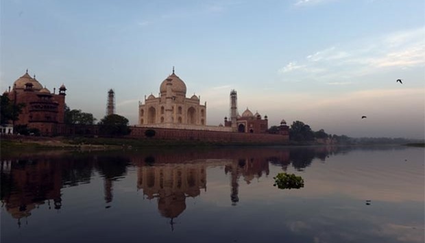 This file photograph taken on April 16, 2016 shows the Taj Mahal reflected in the Yamuna river in Agra.