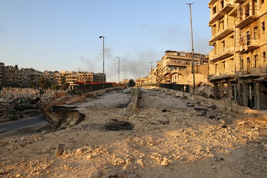 A damaged road is pictured in the rebel held al-Shaar neighbourhood of Aleppo, Syria.